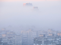 High-rise buildings are seen through the dense fog in Kyiv, Ukraine, on November 25, 2024. NO USE RUSSIA. NO USE BELARUS. (