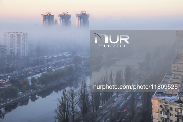 Fog hovers over the Rusanivka district in Kyiv, Ukraine, on November 25, 2024. 