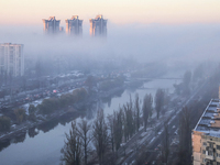 Fog hovers over the Rusanivka district in Kyiv, Ukraine, on November 25, 2024. (