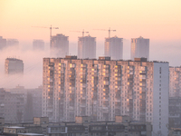 High-rise buildings are seen through the dense fog in Kyiv, Ukraine, on November 25, 2024. NO USE RUSSIA. NO USE BELARUS. (