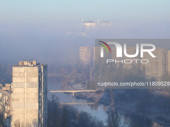 High-rise buildings are seen through the dense fog in Kyiv, Ukraine, on November 25, 2024. NO USE RUSSIA. NO USE BELARUS. (