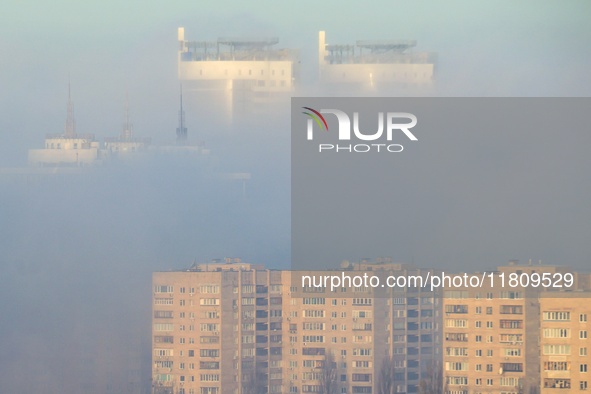 High-rise buildings are seen through the dense fog in Kyiv, Ukraine, on November 25, 2024. NO USE RUSSIA. NO USE BELARUS. 