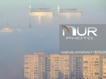 High-rise buildings are seen through the dense fog in Kyiv, Ukraine, on November 25, 2024. NO USE RUSSIA. NO USE BELARUS. (