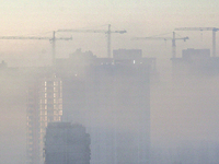 High-rise buildings are seen through the dense fog in Kyiv, Ukraine, on November 25, 2024. NO USE RUSSIA. NO USE BELARUS. (