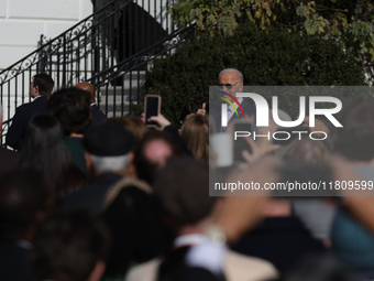 U.S. President Joe Biden greets guests at the 77th anniversary of the National Thanksgiving Turkey presentation on the South Lawn of the Whi...