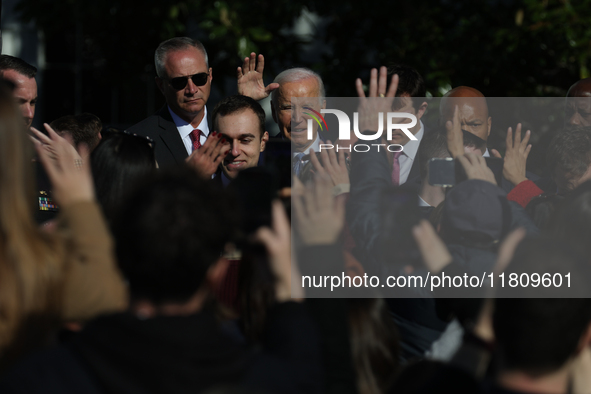 U.S. President Joe Biden greets guests at the 77th anniversary of the National Thanksgiving Turkey presentation on the South Lawn of the Whi...