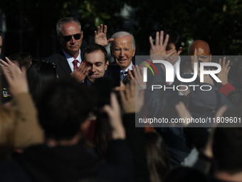 U.S. President Joe Biden greets guests at the 77th anniversary of the National Thanksgiving Turkey presentation on the South Lawn of the Whi...