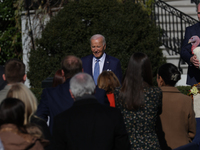 U.S. President Joe Biden greets guests at the 77th anniversary of the National Thanksgiving Turkey presentation on the South Lawn of the Whi...