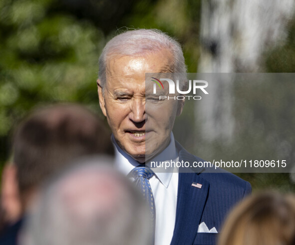 On November 25, 2024, in Washington, D.C., President Joe Biden pardons Peach and Blossom, two Minnesota turkeys, at an event on the South La...