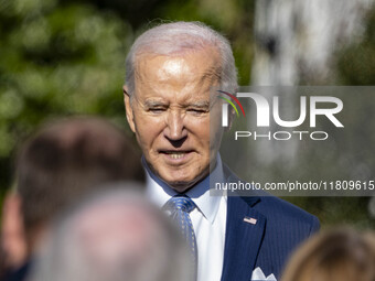 On November 25, 2024, in Washington, D.C., President Joe Biden pardons Peach and Blossom, two Minnesota turkeys, at an event on the South La...