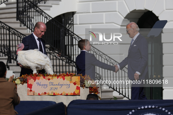 U.S. President Joe Biden hosts the 77th anniversary of the National Thanksgiving Turkey presentation, pardoning two turkeys, 'Peach' and 'Bl...