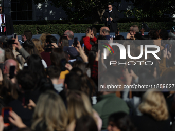 U.S. Secret Service agents watch a crowd at the 77th anniversary of the National Thanksgiving Turkey presentation, pardoning two turkeys, 'P...