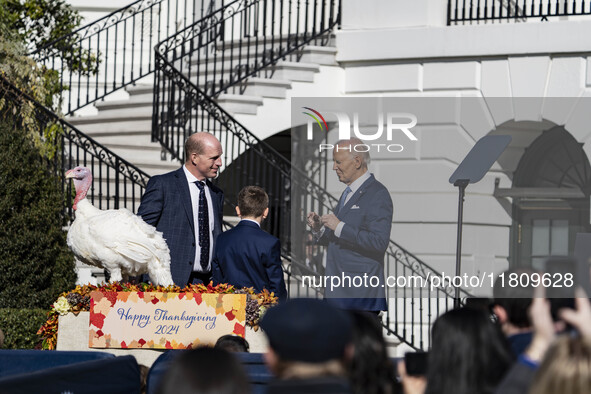 On November 25, 2024, in Washington, D.C., President Joe Biden pardons Peach and Blossom, two Minnesota turkeys, at an event on the South La...