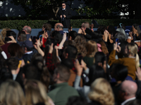 A U.S. Secret Service agent watches a crowd at the 77th anniversary of the National Thanksgiving Turkey presentation, pardoning two turkeys,...