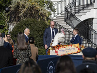 On November 25, 2024, in Washington, D.C., President Joe Biden pardons Peach and Blossom, two Minnesota turkeys, at an event on the South La...