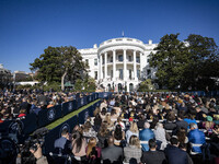 On November 25, 2024, in Washington, D.C., President Joe Biden pardons Peach and Blossom, two Minnesota turkeys, at an event on the South La...