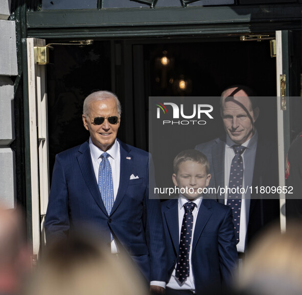 On November 25, 2024, in Washington, D.C., President Joe Biden pardons Peach and Blossom, two Minnesota turkeys, at an event on the South La...