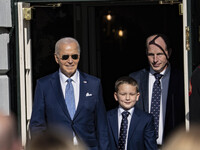 On November 25, 2024, in Washington, D.C., President Joe Biden pardons Peach and Blossom, two Minnesota turkeys, at an event on the South La...