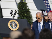 On November 25, 2024, in Washington, D.C., President Joe Biden pardons Peach and Blossom, two Minnesota turkeys, at an event on the South La...