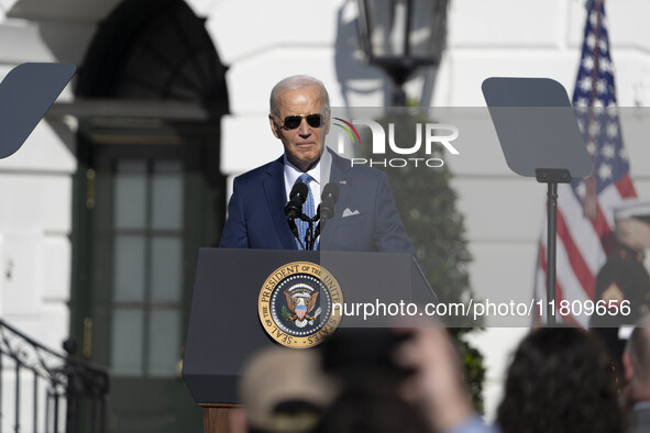 On November 25, 2024, in Washington, D.C., President Joe Biden pardons Peach and Blossom, two Minnesota turkeys, at an event on the South La...