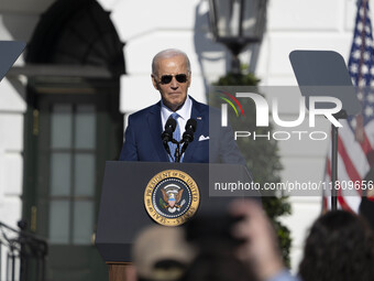 On November 25, 2024, in Washington, D.C., President Joe Biden pardons Peach and Blossom, two Minnesota turkeys, at an event on the South La...