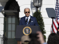 On November 25, 2024, in Washington, D.C., President Joe Biden pardons Peach and Blossom, two Minnesota turkeys, at an event on the South La...