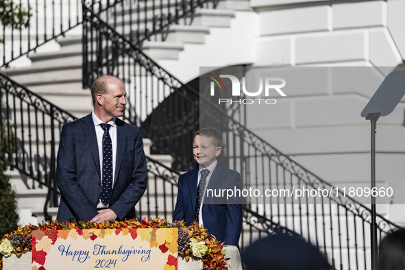 On November 25, 2024, in Washington, D.C., President Joe Biden pardons Peach and Blossom, two Minnesota turkeys, at an event on the South La...