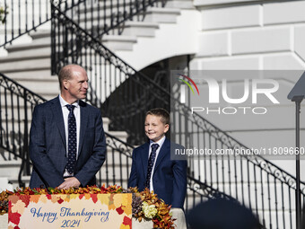 On November 25, 2024, in Washington, D.C., President Joe Biden pardons Peach and Blossom, two Minnesota turkeys, at an event on the South La...