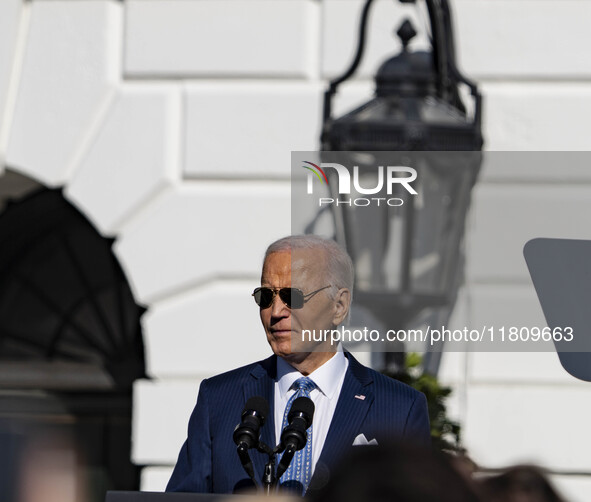 On November 25, 2024, in Washington, D.C., President Joe Biden pardons Peach and Blossom, two Minnesota turkeys, at an event on the South La...