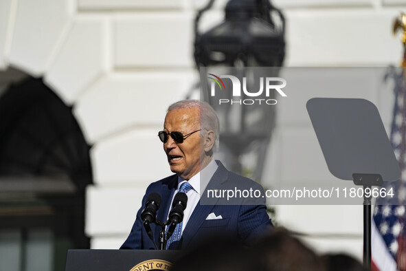 On November 25, 2024, in Washington, D.C., President Joe Biden pardons Peach and Blossom, two Minnesota turkeys, at an event on the South La...