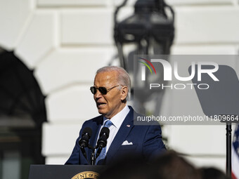 On November 25, 2024, in Washington, D.C., President Joe Biden pardons Peach and Blossom, two Minnesota turkeys, at an event on the South La...