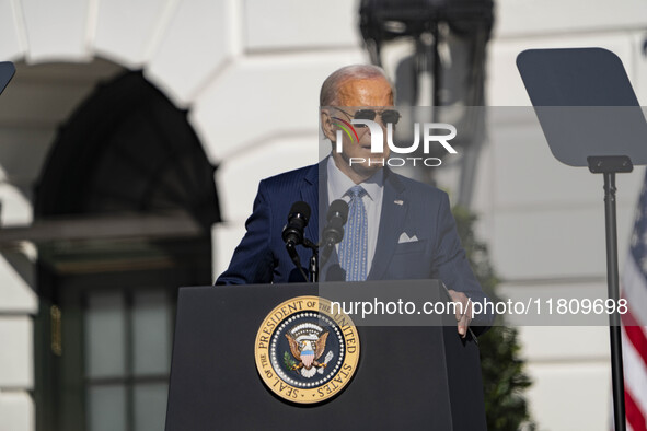 On November 25, 2024, in Washington, D.C., President Joe Biden pardons Peach and Blossom, two Minnesota turkeys, at an event on the South La...