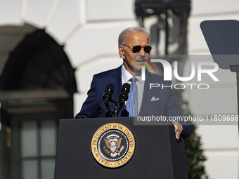 On November 25, 2024, in Washington, D.C., President Joe Biden pardons Peach and Blossom, two Minnesota turkeys, at an event on the South La...