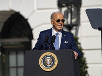 On November 25, 2024, in Washington, D.C., President Joe Biden pardons Peach and Blossom, two Minnesota turkeys, at an event on the South La...