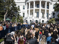 On November 25, 2024, in Washington, D.C., President Joe Biden pardons Peach and Blossom, two Minnesota turkeys, at an event on the South La...