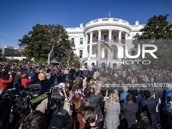 On November 25, 2024, in Washington, D.C., President Joe Biden pardons Peach and Blossom, two Minnesota turkeys, at an event on the South La...