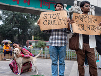 Some students of Dhaka University stage a protest against the action of killing dogs by poisoned food at Japan Garden City in Dhaka, Banglad...