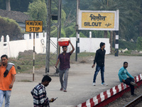 Indian people are seen at the railway station in Silout, Bihar, on November 24, 2024. (