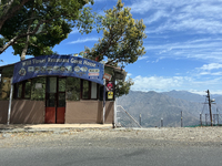 A restaurant and guest house are in the hill station of Mussoorie, Uttarakhand, India, on April 18, 2024. (