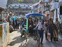 A crowd of people gathers along the Mall Road in Mussoorie, Uttarakhand, India, on April 18, 2024. (