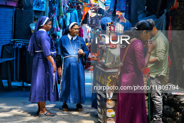 Nuns shop at the Bhutia Bazaar (Tibetan Market) in Nainital, Uttarakhand, India, on April 19, 2024. The Tibetan Market is located by Naini L...