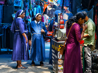 Nuns shop at the Bhutia Bazaar (Tibetan Market) in Nainital, Uttarakhand, India, on April 19, 2024. The Tibetan Market is located by Naini L...