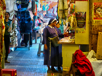 Nuns shop at the Bhutia Bazaar (Tibetan Market) in Nainital, Uttarakhand, India, on April 19, 2024. The Tibetan Market is located by Naini L...