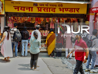 A shop sells religious items by the Naini Devi Temple at the Bhutia Bazaar (Tibetan Market) in Nainital, Uttarakhand, India, on April 19, 20...