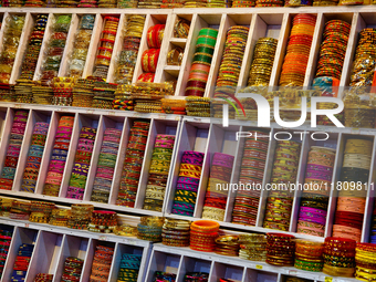 Colorful bangles are displayed at a shop in the Bhutia Bazaar (Tibetan Market) in Nainital, Uttarakhand, India, on April 19, 2024. The Tibet...