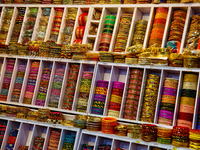 Colorful bangles are displayed at a shop in the Bhutia Bazaar (Tibetan Market) in Nainital, Uttarakhand, India, on April 19, 2024. The Tibet...