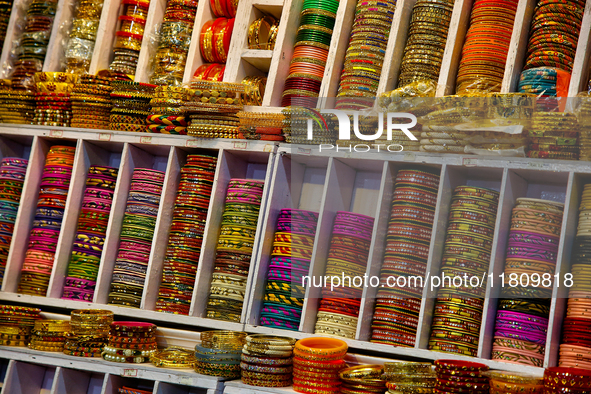 Colorful bangles are displayed at a shop in the Bhutia Bazaar (Tibetan Market) in Nainital, Uttarakhand, India, on April 19, 2024. The Tibet...