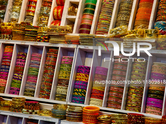 Colorful bangles are displayed at a shop in the Bhutia Bazaar (Tibetan Market) in Nainital, Uttarakhand, India, on April 19, 2024. The Tibet...