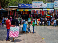 Shoppers visit the Bhutia Bazaar (Tibetan Market) in Nainital, Uttarakhand, India, on April 19, 2024. The Tibetan Market is located by Naini...