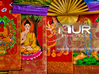 Religious paintings are displayed in a shop at the Bhutia Bazaar (Tibetan Market) in Nainital, Uttarakhand, India, on April 19, 2024. The Ti...